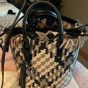 Used Michael Kors Marley Bucket Summer Straw Black, grey & white Purse Bucket.